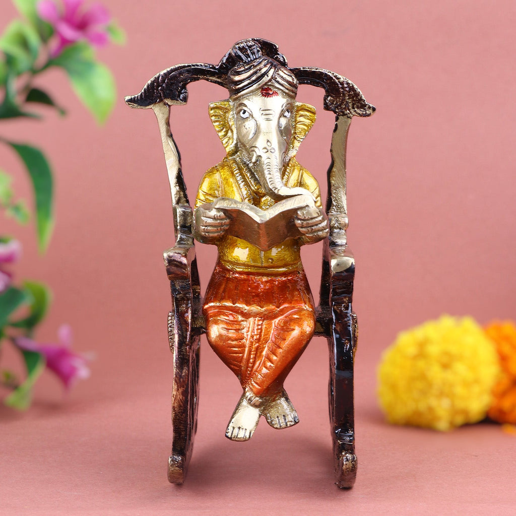 Pure brass Ganesha statue depicting Lord Ganesha reading a book, symbolizing wisdom, knowledge, and learning. Perfect for study tables, home temples, or as a thoughtful gift for students and seekers of intellect. India’s Largest Pooja Accessories Brand – www.satvikworld.com