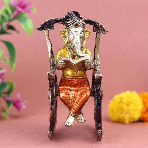 Pure brass Ganesha statue depicting Lord Ganesha reading a book, symbolizing wisdom, knowledge, and learning. Perfect for study tables, home temples, or as a thoughtful gift for students and seekers of intellect. India’s Largest Pooja Accessories Brand – www.satvikworld.com
