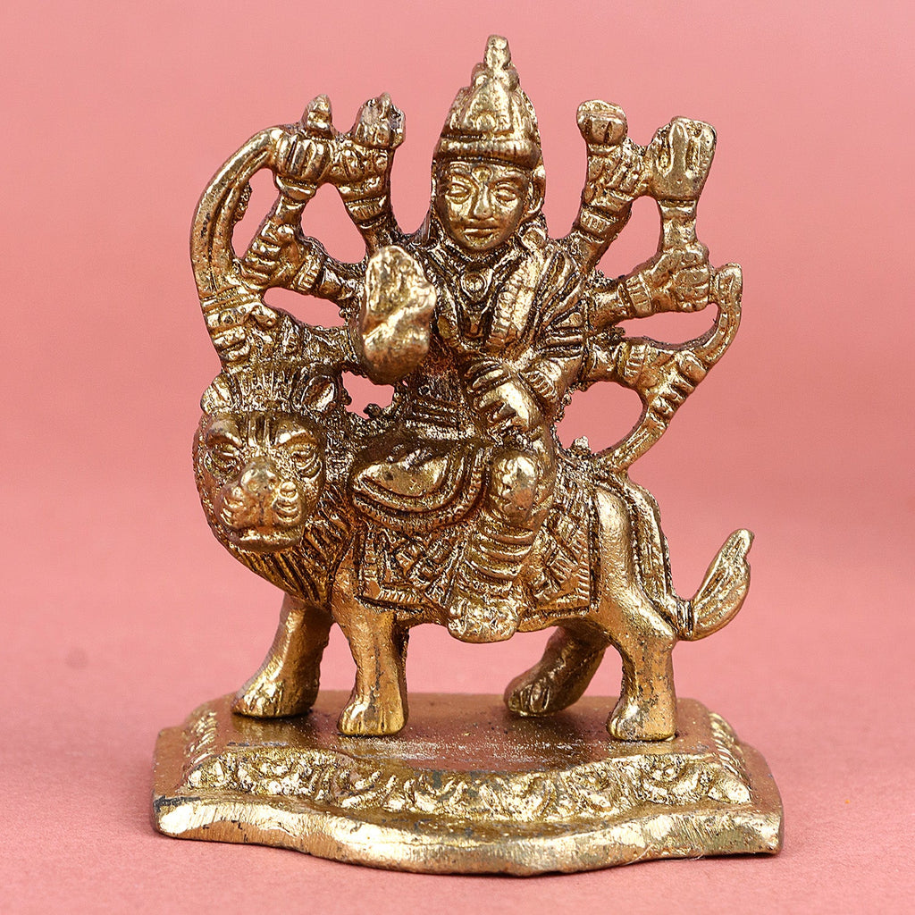 Engraved brass Maa Sherawali idol, depicting the goddess seated on a lion, intricately detailed with traditional ornaments and divine symbols, symbolizing strength, protection, and grace. India’s Largest Pooja Accessories Brand – www.satvikworld.com