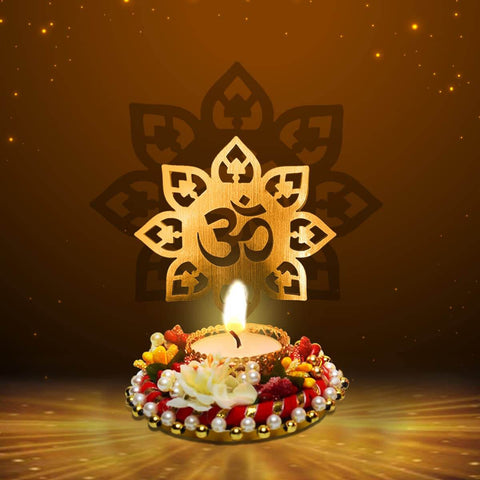 Beautiful Decorative OM Shadow Diya crafted from metal, featuring a glowing OM symbol projection when lit, ideal for spiritual ambiance during pooja, meditation, and festive decor. India’s Largest Pooja Accessories Brand – www.satvikworld.com