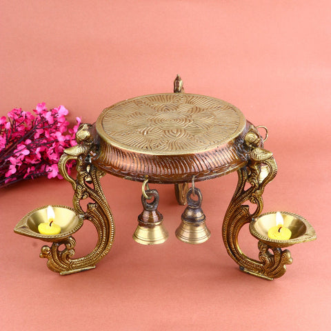 Decorative Brass Chowki With Diya And Bell – Elegant Brass Chowki Set with Diya and Bell, Perfect for Temple, Puja, and Spiritual Worship. Handcrafted with Intricate Detailing, Ideal for Home Decor and Mandir Decoration. Brings a Divine Touch to Your Sacred Space, Enhancing the Atmosphere with Light and Sound | India’s Largest Pooja Accessories Brand – www.satvikworld.com